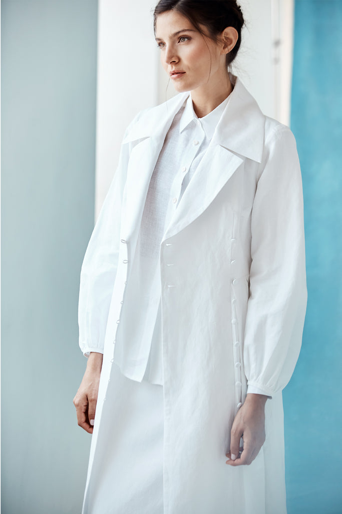 Model wearing Danielle Fichera Luisa Coat Dress in White