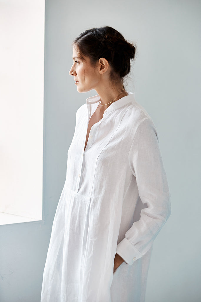 Model wearing the Eugenie Dress in White Linen