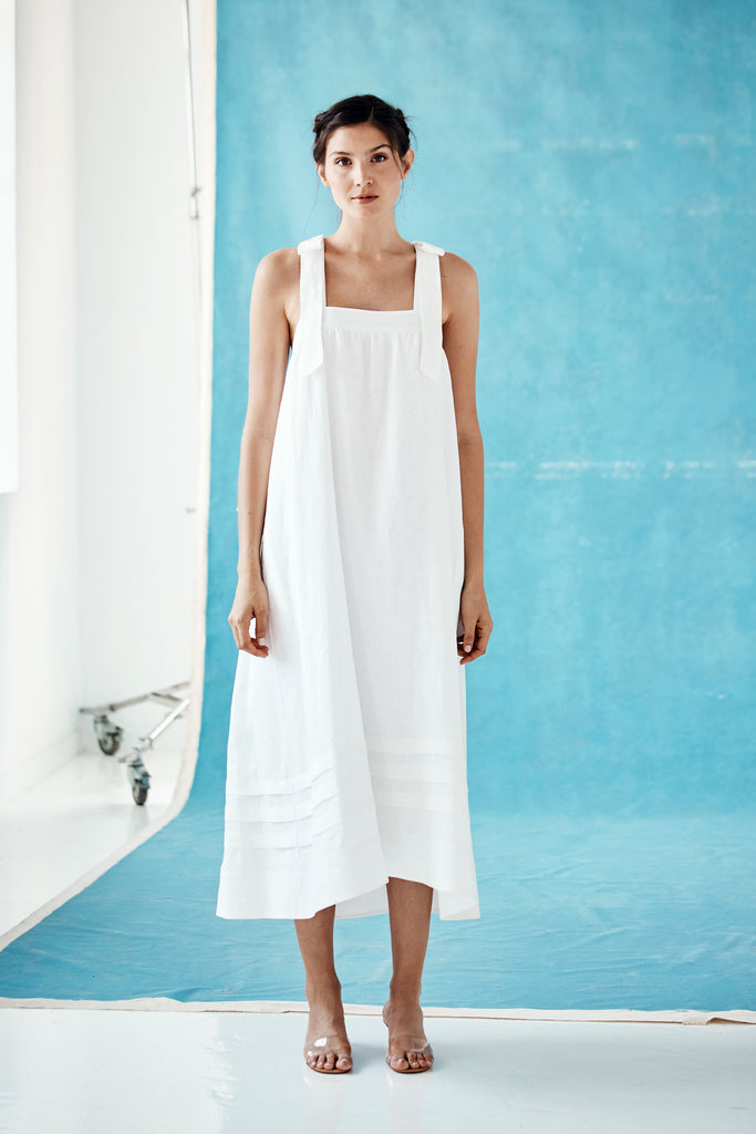 Model wearing the Lina Dress in white