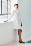 Model wearing the Eugenie Dress in White Linen