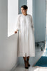 Model looking to the side wearing Mia Caftan Dress made with White Linen and Cotton